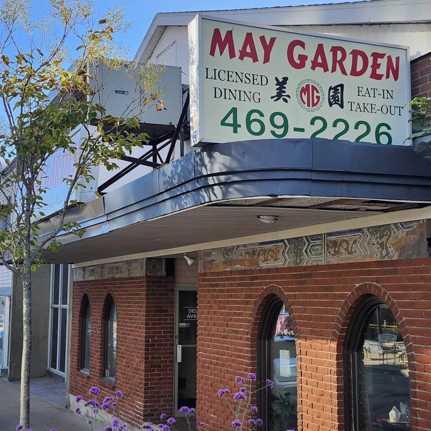 May Garden Restaurant exterior with brick facade and signage, Dartmouth NS