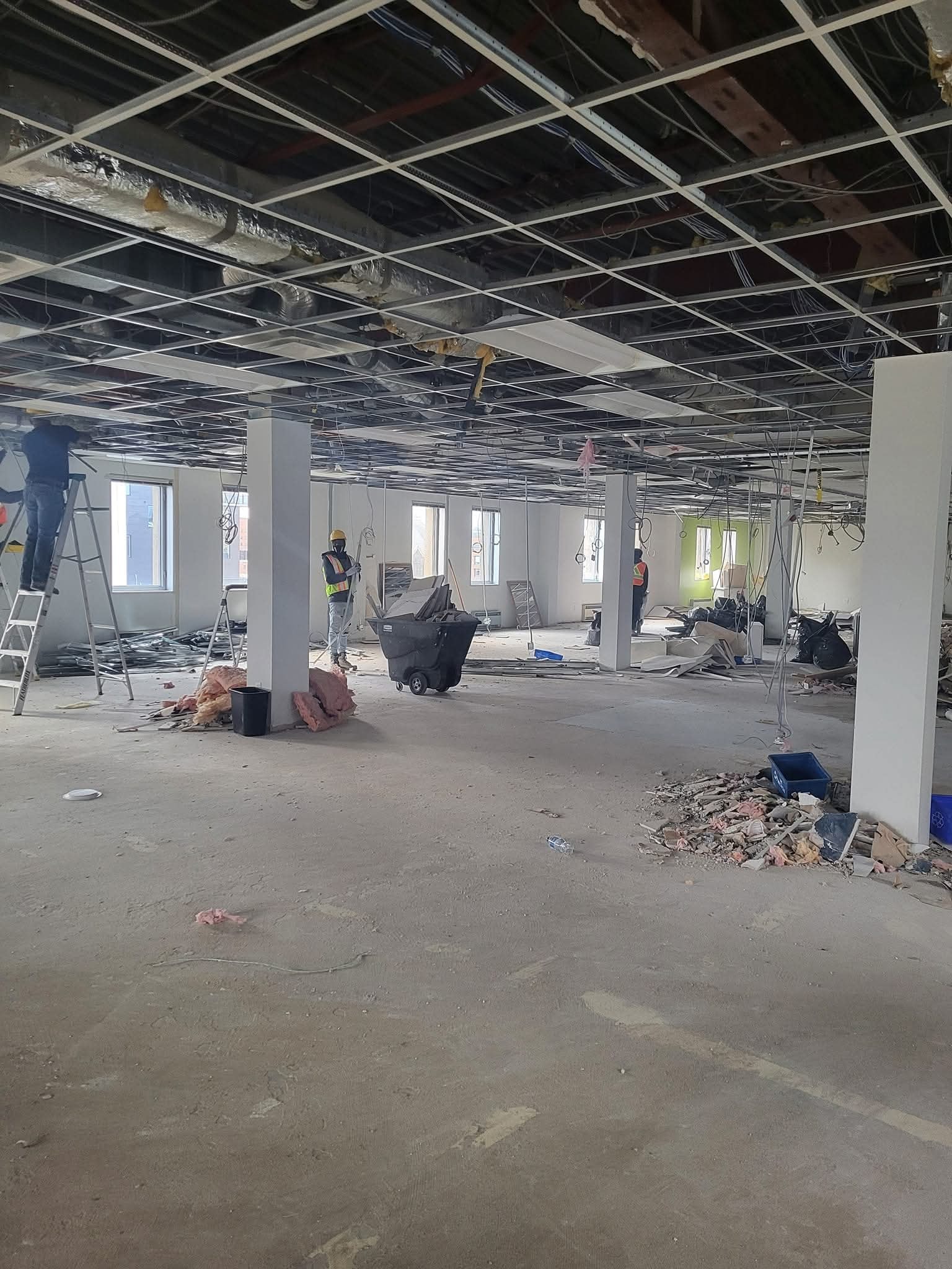 Interior construction site with exposed ceiling framework