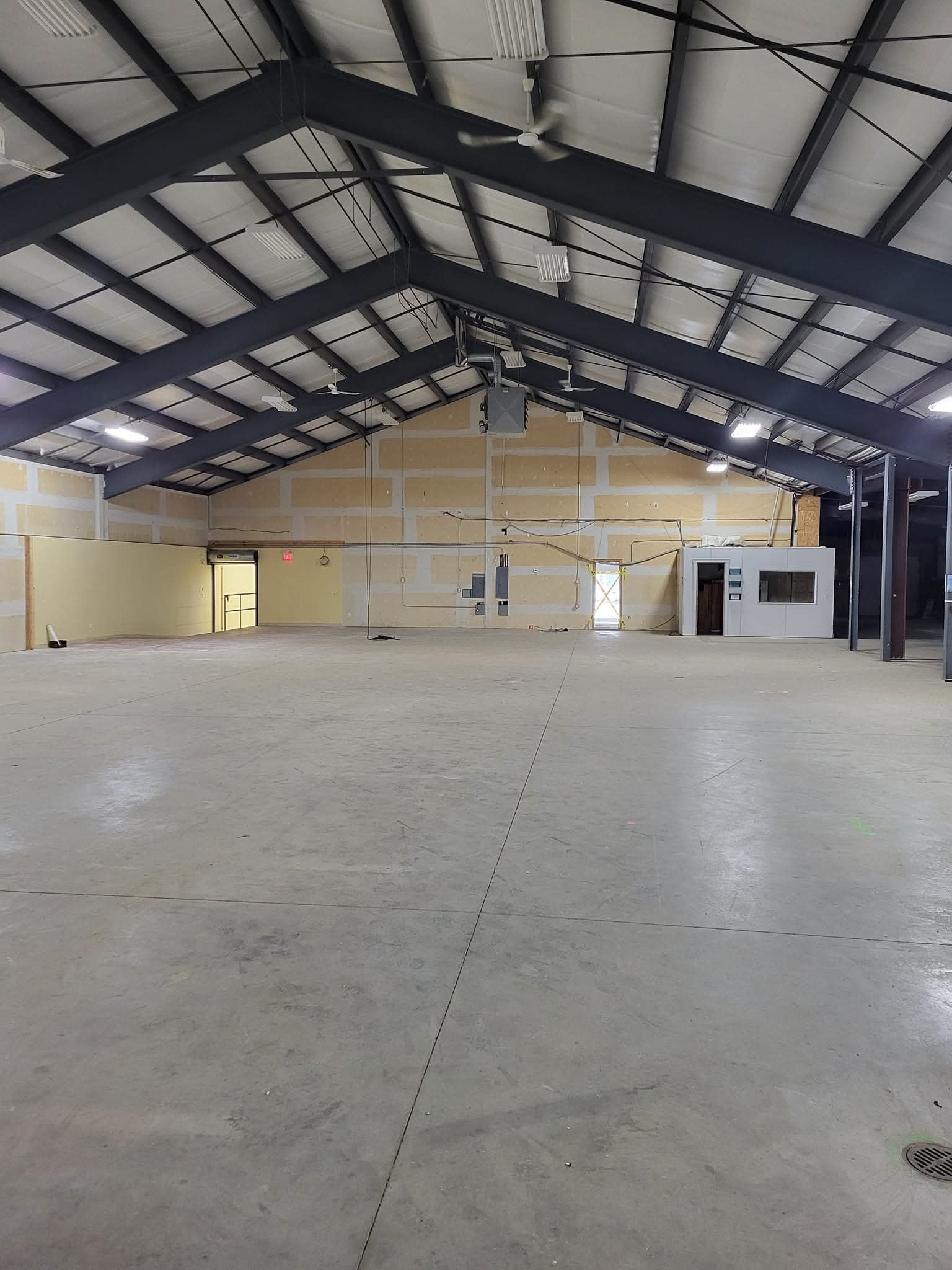 Empty industrial warehouse after interior demolition
